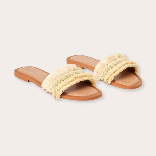 The Perfect Finishing Touch to Any Summer Outfit? A Pair of Raffia Sandals